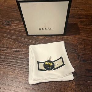 Gucci double sided charm